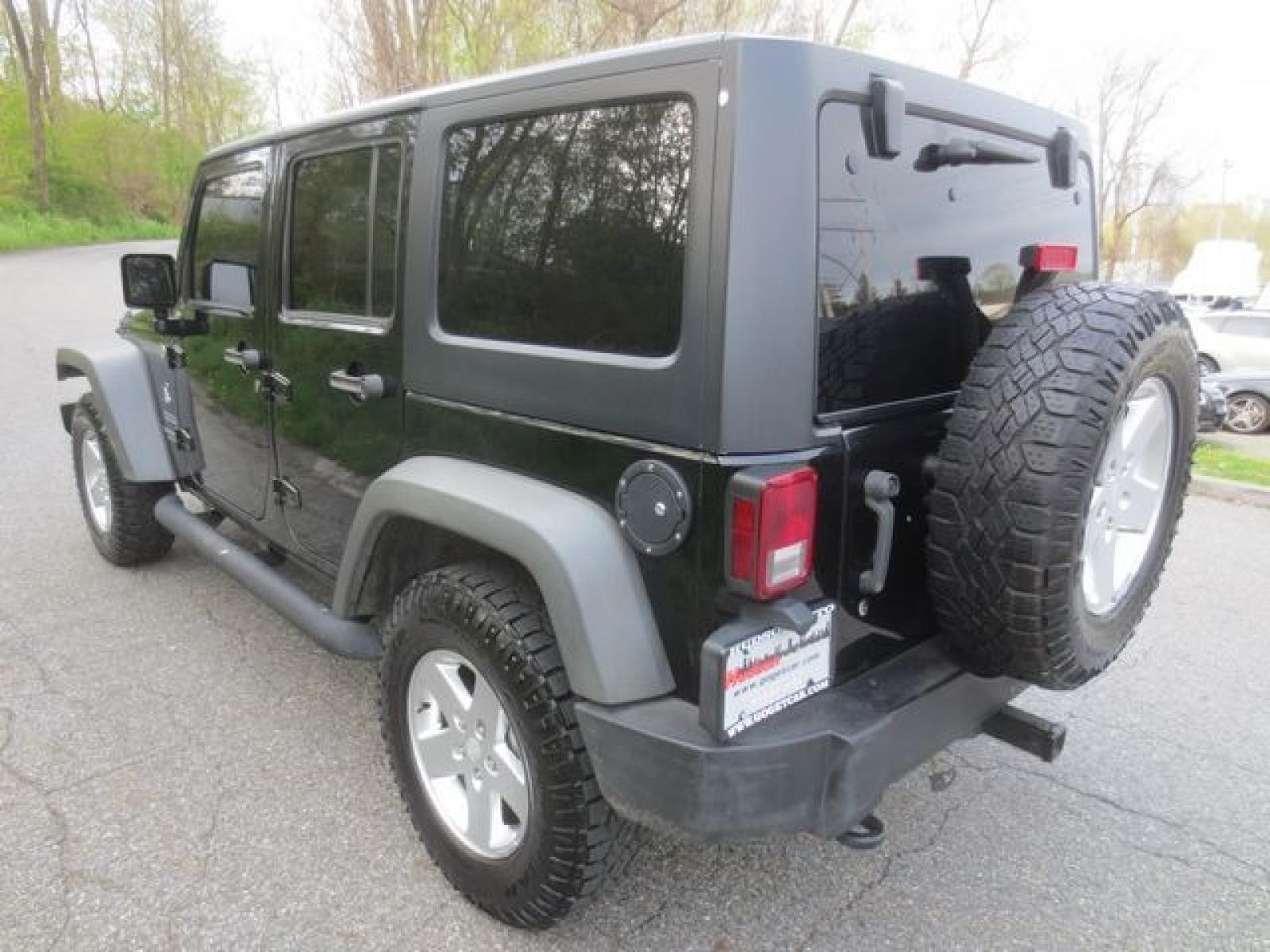 2011 Black /Black Jeep Wrangler Sport (1J4BA3H15BL) with an 3.8L V6 OHV 12V engine, Automatic transmission, located at 270 US Route 6, Mahopac, NY, 10541, (845) 621-0895, 41.349022, -73.755280 - Photo #4